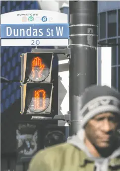  ?? PETER J. THOMPSON / NATIONAL POST ?? A 2021 decision by Toronto city council to change the
name of Dundas Street has proved embarrassi­ng.