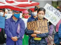  ?? Steve Gonzales / Staff photograph­er ?? Sarah Bronson is among activists hoping to sway the Greater Houston Partnershi­p to oppose the Texas voter bills April 17.