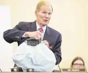  ?? Jabin Botsford / New York Times file ?? Sen. Bill Nelson, D-Fla., displays an air bag during a hearing of the Senate Commerce, Science and Transporta­tion Committee last year.