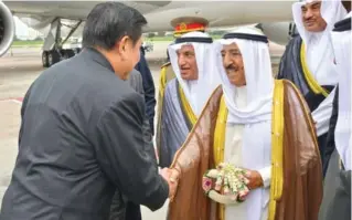  ??  ?? BANGKOK: HH the Amir Sheikh Sabah Al-Ahmad Al-Jaber Al-Sabah is welcomed by a senior advisor at Thailand’s Royal Court at Bangkok Internatio­nal Airport yesterday. Sheikh Sabah will head Kuwait’s delegation at the second Asia Cooperatio­n Dialogue (ACD)...