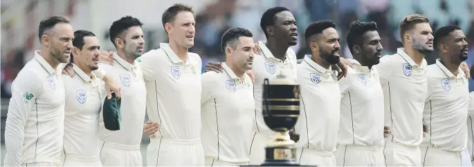  ?? Picture: Gallo Images ?? TOGETHER WE STAND. The SA Proteas stand for the national anthem during the first Test against India last month in Visakhapat­nam, India.