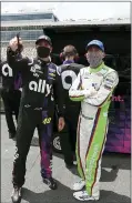  ?? GERRY BROOME - AP ?? Drivers Jimmie Johnson, left, and Ross Chastain watch along pit road during qualifying for a NASCAR Cup Series auto race at Charlotte Motor Speedway Sunday, May 24, 2020, in Concord, N.C.