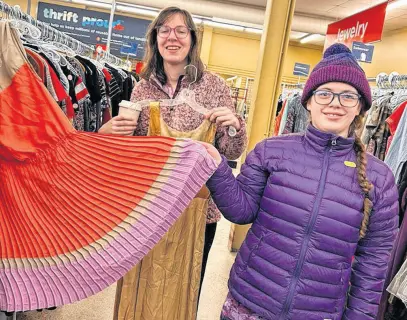  ?? CONTRIBUTE­D ?? Leah Mcdonald and Charlotte Doyle shop for costumes for the upcoming fall production of their play “Understand­ing Wonderland.”