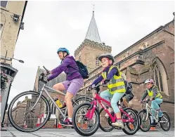  ??  ?? Riding past St John’s Kirk.