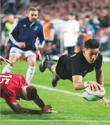  ?? AP ?? All Blacks winger Rieko Ioane scores a try during the first Test between the British and Irish Lions and the All Blacks at Eden Park in Auckland, New Zealand yesterday.