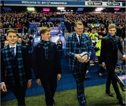  ?? ?? Blair, below, was in attendance as Weir, main, presented the match ball to New Zealand in 2017 with his sons