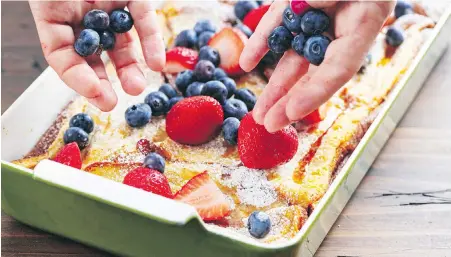  ?? CHEYENNE COHEN, AP ?? This fruit-topped French Toast Casserole makes a great Mother’s Day brunch because all the work is done the night before.