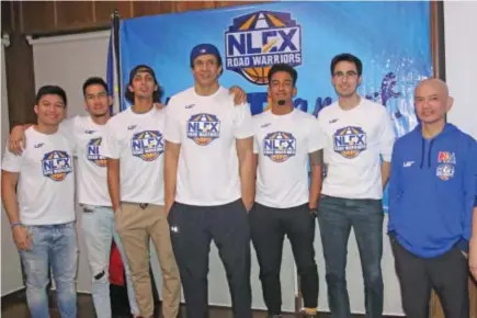  ?? Photo by Milo Brioso ?? TEAM OF THE NORTH. NLEX Road Warriors led by coach Yeng Guiao(2nd from right) and team captain Larry Fonacier(3rd from right) mingled with fans during a meet and greet in Baguio City after joining the Panagbenga festivitie­s.