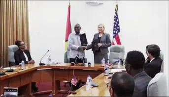 ?? ?? Minister of Home Affairs Robeson Benn (left) and US Ambassador to Guyana Nicole Theriot (Antonio Dey photo)