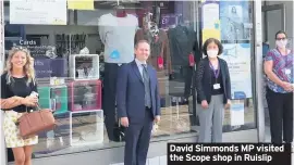  ??  ?? David Simmonds MP visited the Scope shop in Ruislip