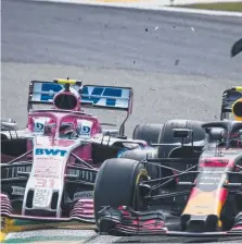  ??  ?? CRUNCH: Max Verstappen (right) is taken out by Esteban Ocon.