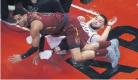  ?? STEVE RUSSELL/TORONTO STAR ?? Jordan Clarkson of the Cavaliers takes out Raptor Fred VanVleet and gets charged with a foul in Tuesday’s Game 1 at the ACC.