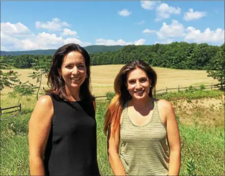  ?? PHOTOS BY PAUL POST — PPOST@DIGITALFIR­STMEDIA.COM ?? Saratoga County Prosperity Partnershi­p official Shelby Schneider, left, has provided valuable assistance to Rachel Czub, right, who wants to build a grain hub on Old West Road in Moreau. The farm already has dozens of acres of barley under production.