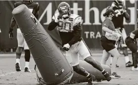  ?? Brett Coomer / Staff photograph­er ?? On having J.J. Watt as a teammate, rookie defensive tackle Ross Blacklock (90) says, “It’s an honor being able to play next to him and to play with him.”