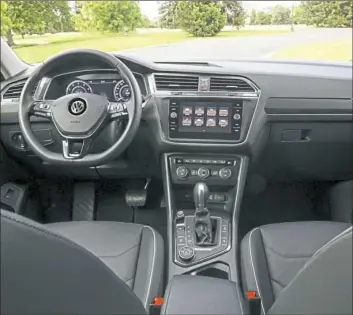  ??  ?? Volkswagen makes a rather nice cockpit in general, and the 2018 Tiguan is no exception. Still, that extra third row is more of a compromise than anything.