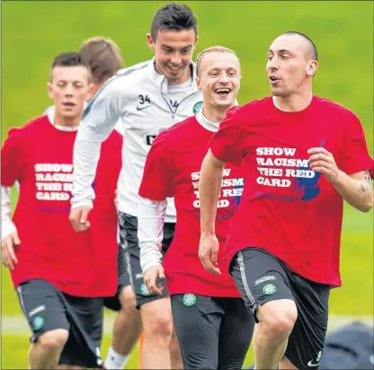  ?? Picture: SNS ?? LEADING FROM THE FRONT: Captain Scott Brown is making sure that his Celtic team-mates follow his example.