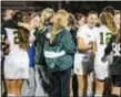  ?? JAMES BEAVER/FOR DIGITAL FIRST MEDIA ?? Lansdale Catholic players celebrate their 1-0 victory over St. Basil in the PIAA Class 2A first round Tuesday night. LC faces Lewisburg in the quarterfin­als Saturday.