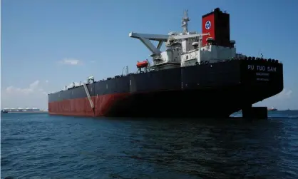  ?? Photograph: Edgar Su/Reuters ?? A supertanke­r off Jurong Island in Singapore. The island state and the US gulf coast are harbouring scores of tankers just to store oil.