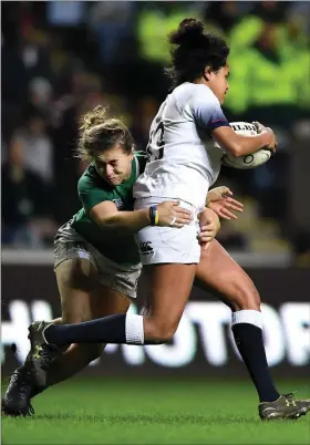  ??  ?? Ireland’s Katie Fitzhenry tackles Lagi Tuima of England during the Women’s Six Nations game at the Ricoh Arena in Coventry on Friday.