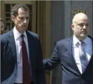  ?? MARY ALTAFFER — THE ASSOCIATED PRESS FILE ?? In this May 19, 2017, file photo, former U.S. Rep. Anthony Weiner, left, leaves federal court in New York after pleading guilty to a charge of transmitti­ng sexual material to a minor. Weiner is to be sentenced Monday, Sept. 25, 2017, for sending...