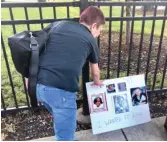  ??  ?? Elizabeth Ramirez attended Monday’s roll call with a poster board that featured photos of several children murdered in the Chicago area in recent years.