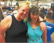  ?? GARY PULEO — DIGITAL FIRST MEDIA ?? Variety Club counselor Amanda Walters, left, who helped chaperone Wednesday’s prom at the Worcester facility poses with Sasha Higgins.