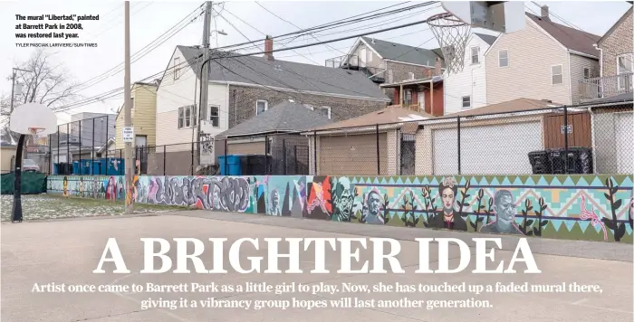  ?? TYLER PASCIAK LARIVIERE/SUN-TIMES ?? The mural “Libertad,” painted at Barrett Park in 2008, was restored last year.