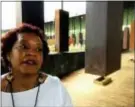  ?? BETH J. HARPAZ — THE ASSOCIATED PRESS ?? Toni Battle stands inside a display at the National Memorial for Peace and Justice, a new memorial to honor thousands of people killed in racist lynchings, which opened to the public Thursday in Montgomery, Ala. Battle, who drove from San Francisco to...