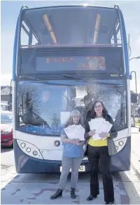  ??  ?? ●●Janet Taylor and Julie Lowe with the petition against cuts to the 378 service