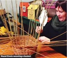  ??  ?? Hazel Ennis weaving a basket