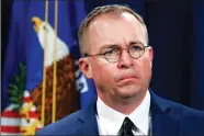  ?? AP FILE PHOTO BY JACQUELYN MARTIN ?? In this 2018 file photo, Mick Mulvaney, acting director of the Consumer Financial Protection Bureau (CFPB), and Director of the Office of Management, listens during a news conference at the Department of Justice in Washington.