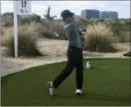  ?? DOUG FERGUSON — THE ASSOCIATED PRESS ?? Jordan Spieth tees off on the 17th hole during the proam for the Hero World Challenge golf tournament at the Albany Golf Club in Nassau, Bahamas, Wednesday. Spieth is among the new generation that Tiger Woods now has to try to beat.