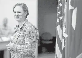  ?? Yi-Chin Lee / Houston Chronicle ?? Maj. Lisa Jaster, the first female Army Reserve soldier to complete Army Ranger School, told members of the 75th training command on Saturday that people should be afforded opportunit­ies because of their merits.