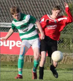  ??  ?? Seán Fitzpatric­k (Shamrock Rovers) in a battle for the ball with Eoin Power (St. Leonards).