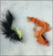  ?? (Arkansas Democrat-Gazette/Bryan Hendricks) ?? Karl Schmeucker caught scores of fish Thursday using these two alt patterns on Crooked Creek.