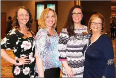  ?? NWA Democrat-Gazette/CARIN SCHOPPMEYE­R ?? Katlyn Taylor (from left), Twyla Rownak, Shauna Mauk and Renee Hutton welcome guests to the Corporate Luncheon on May 1.