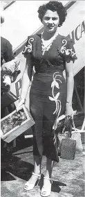  ??  ?? In 1950, Miss Toni Ziadie returns to Jamaica from a Beauty Contest in California wearing a
pencil dress.