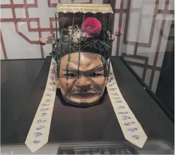  ?? NEIL STEINBERG/SUN-TIMES ?? A mask of Tai Shan Wang, “Judge of the 7th Court” in an imperial Chinese vision of hell, on display at the “Death: Life’s Greatest Mystery” show at the Field Museum until Aug. 27.