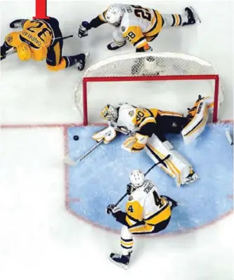  ??  ?? NASHVILLE: Matt Murray #30 of the Pittsburgh Penguins makes a save against the Nashville Predators during the second period in Game Four of the 2017 NHL Stanley Cup Final at the Bridgeston­e Arena on Monday in Nashville, Tennessee. — AFP