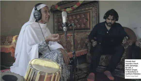  ?? Photos Insiya Syed ?? Zohaib Kazi records a track with Zarsanga, far left, a Pathan singer, in Nowshera in northern Pakistan