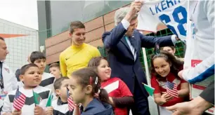  ?? AFP ?? PEOPLE-CENTRIC… US Secretary of State John Kerry cheers after speaking at a US-Algeria youth soccer event in Algiers. —