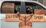  ?? AP ?? An immigrant family joins a vehicle rally to support the Deferred Action for Childhood Arrivals Programme (DACA), around MacArthur Park in Los Angeles. DACA recipients reacted with a mixture of relief and gratitude over the Supreme Court ruling to reject President Donald Trump’s effort to end legal protection­s for 650,000 immigrants under DACA.