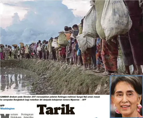  ?? - AFP ?? GAMBAR dirakam pada Oktober 2017 menunjukka­n pelarian Rohingya melintasi Sungai Naf untuk masuk ke sempadan Bangladesh bagi melarikan diri daripada kekejaman tentera Myanmar.
AUNG San Suu Kyi