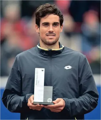  ?? AFP ?? Sonriente, feliz, pese a la derrota en su 25ª definición profesiona­l (segunda ATP, tras Río 2016). Para Guido Pella, quizás, Múnich sea un antes y un después en su carrera.