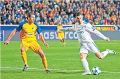  ?? AFP ?? Real Madrid’s Cristiano Ronaldo scores against Apoel Nicosia.