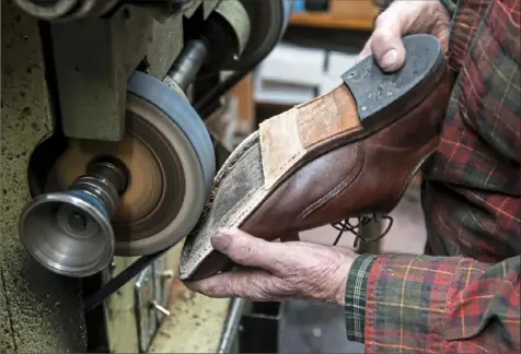  ?? Nate Guidry/Post-Gazette ?? Bill Wells, 81, owner of Charles the Cobbler, works on customer shoes Tuesday in his Peters shop.