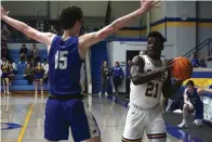  ?? The Sentinel-Record/Krishnan Collins ?? ■ Lakeside’s Braylen Russell (21) looks to pass around Greenbrier’s Aidan Berry (15) at Lakeside Athletic Complex Tuesday.