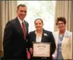  ?? SUBMITTED BY MANSFIELD UNIVERSITY ?? Shown from left, Mansfield President Fran Hendricks, Heather Long, Leta Jo Myers Maue, chair of the Awards Committee.