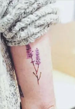  ?? COURTESY OF THE UNIVERSITY OF WATERLOO ?? This tattoo of a sprig of lavender was sent to staff at the University of Waterloo’s library as part of a project to recommend books based on tattoos.