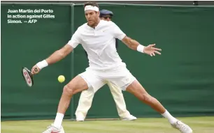  ?? AFP ?? Juan Martin del porto in action against Gilles Simon. —